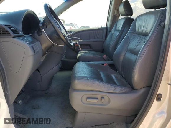 2007 Honda Odyssey EX-L z VIN 5FNRL38647B028078, wystawiony jako Copart lot #56208005 z przebiegiem 192 000 mil mil oraz Szkoda całkowita • Salvage title. Historia ofert i sprzedaży dostępna na DreamBid. Obrazek 7.