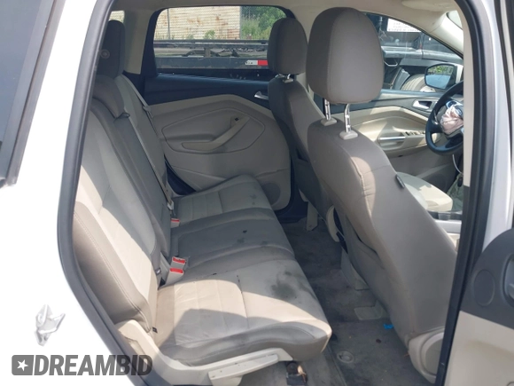 2014 Ford Escape SE with VIN 1FMCU9G99EUC81141, listed as a IAAI auction lot 42436279 with 123,947 mi miles and . Bid and sale history available at DreamBid. Image 8.