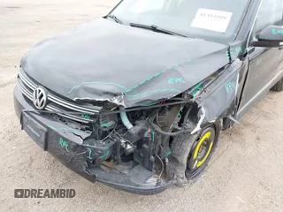 2016 Volkswagen Tiguan S with VIN WVGBV7AX9GW566451, listed as a IAAI auction lot 41393999 with 51,616 mi miles and . Bid and sale history available at DreamBid. Image 6.