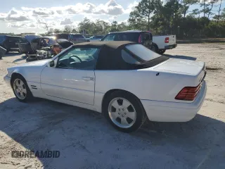 1999 Mercedes-Benz SL-Class with VIN WDBFA68F5XF184828, listed as a Copart auction lot 85935384 with 64,129 mi miles and Clean Title. Bid and sale history available at carsss.com. Image 2.