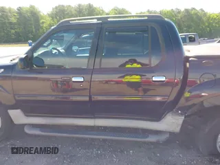2003 Ford Explorer Sport Trac XLS z VIN 1FMZU77E23UB74361, wystawiony jako IAAI lot #42305659 z przebiegiem 193 291 mil mil oraz . Historia ofert i sprzedaży dostępna na DreamBid. Obrazek 14.