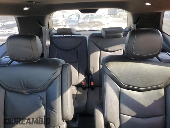 2020 Cadillac XT6 FWD Premium Luxury z VIN 1GYKPCRSXLZ101003, wystawiony jako Copart lot #51844525 z przebiegiem 115 061 mil mil oraz Szkoda całkowita • Salvage title. Historia ofert i sprzedaży dostępna na DreamBid. Obrazek 10.