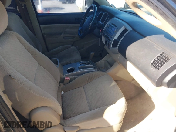 2009 Toyota Tacoma PreRunner with VIN 3TMJU62N59M088137, listed as a IAAI auction lot 41775410 with 217,331 mi miles. Bid and sale history available at carsss.com. Image 5.
