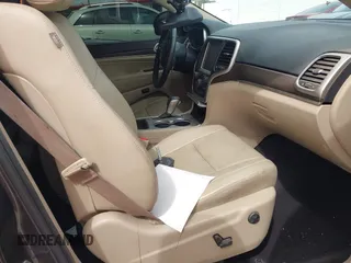 2017 Jeep Grand Cherokee Limited with VIN 1C4RJEBG4HC838019, listed as a IAAI auction lot 41804665 with 135,980 mi miles. Bid and sale history available at carsss.com. Image 5.