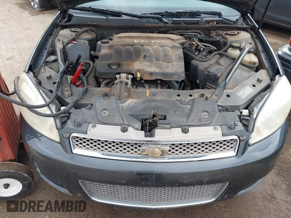 2014 Chevrolet Impala LT with VIN 2G1WB5E35E1123415, listed as a IAAI auction lot 41101111 with 129,870 mi miles and . Bid and sale history available at DreamBid. Image 10.