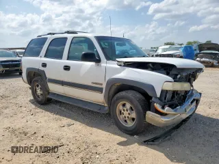 2002 Chevrolet Tahoe LS with VIN 1GNEC13Z32R200857, listed as a Copart auction lot 59812865 with 116,823 mi miles and Salvage title. Bid and sale history available at DreamBid. Image 4.