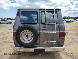 1993 GMC Vandura z VIN 1GDEG25KXPF515257, wystawiony jako Copart lot #56179665 z przebiegiem 308 324 mil mil oraz Szkody całkowita. Historia ofert i sprzedaży dostępna na DreamBid. Obrazek 6.