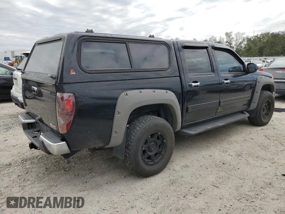 2010 GMC Canyon SLE1 with VIN 1GTJTCDE0A8136926, listed as a Copart auction lot 76193164 with 214,608 mi miles and Salvage title. Bid and sale history available at DreamBid. Image 3.