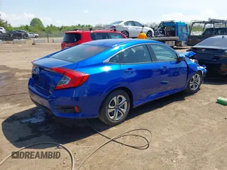2018 Honda Civic LX with VIN 19XFC2F53JE020297, listed as a IAAI auction lot 42114807 with 124,058 mi miles and . Bid and sale history available at carsss.com. Image 4.