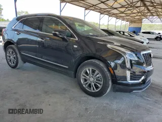 2021 Cadillac XT5 FWD Premium Luxury с VIN 1GYKNCRSXMZ155473, выставлен на аукционе Copart как лот 59883874 с пробегом 2 038 миль миль и Списание • Salvage title. История ставок и продаж доступна на DreamBid. Изображение 4.
