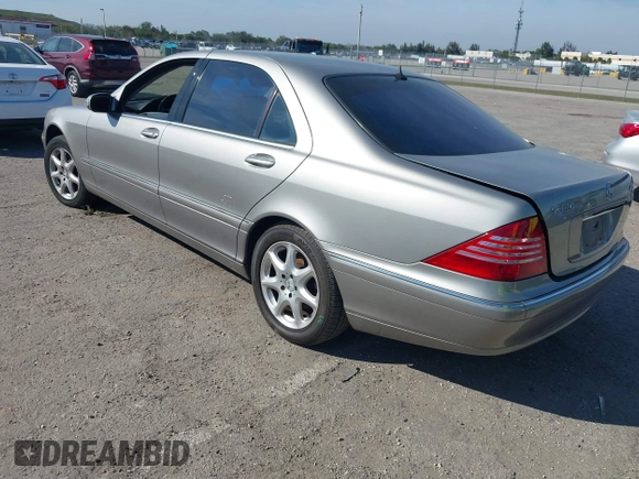 2004 Mercedes-Benz S-Class 4.3L with VIN WDBNG83J14A406775, listed as a IAAI auction lot 41442333 with 77,463 mi miles. Bid and sale history available at carsss.com. Image 3.