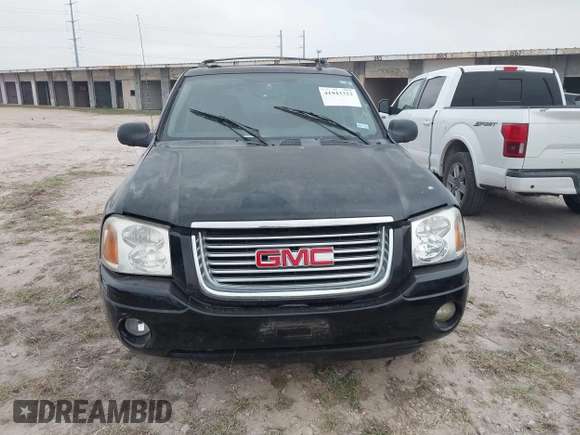 2006 GMC Envoy SLT with VIN 1GKDS13S462241866, listed as a IAAI auction lot 41943322 with 90,695 mi miles. Bid and sale history available at carsss.com. Image 12.