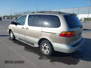 2000 Toyota Sienna LE with VIN 4T3ZF13C9YU189305, listed as a IAAI auction lot 42201168 with 218,254 mi miles and . Bid and sale history available at DreamBid. Image 3.
