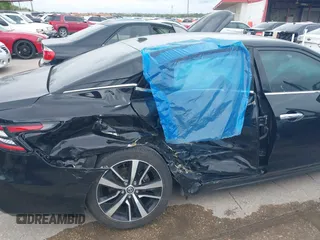2021 Nissan Maxima SV z VIN 1N4AA6CV2MC508525, wystawiony jako IAAI lot #41892374 z przebiegiem 95 532 mil mil oraz . Historia ofert i sprzedaży dostępna na DreamBid. Obrazek 6.