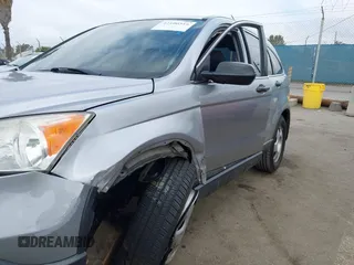2007 Honda CR-V LX with VIN JHLRE38397C020722, listed as a IAAI auction lot 42100516 with 161,561 mi miles. Bid and sale history available at carsss.com. Image 17.