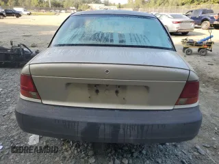 1997 Saturn SL with VIN 1G8ZH5285VZ365951, listed as a Copart auction lot 70902264 with 104,781 mi miles and Salvage Title. Bid and sale history available at carsss.com. Image 6.