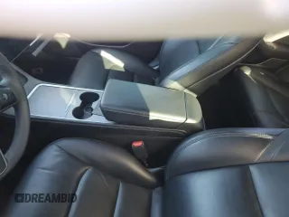 2021 Tesla Model 3 Standard Range Plus with VIN 5YJ3E1EA8MF852089, listed as a Copart auction lot 46157845 with 82,979 mi miles and Salvage Title. Bid and sale history available at DreamBid. Image 7.