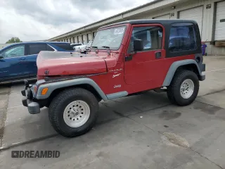 1998 Jeep Wrangler Sport with VIN 1J4FY19S4WP739900, listed as a Copart auction lot 64238095 with 214,084 mi miles and Salvage title. Bid and sale history available at DreamBid. Image 1.