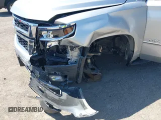 2015 Chevrolet Tahoe LT with VIN 1GNSCBKC6FR303850, listed as a IAAI auction lot 42254115 with 147,856 mi miles and . Bid and sale history available at DreamBid. Image 6.