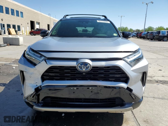 2023 Toyota RAV4 Hybrid XSE with VIN JTME6RFV3PD543597, listed as a Copart auction lot 56715555 with 33,092 mi miles and Salvage title. Bid and sale history available at DreamBid. Image 5.