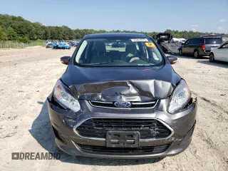 2017 Ford C-Max Energi SE with VIN 1FADP5EUXHL108664, listed as a Copart auction lot 63443913 with 104,634 mi miles. Bid and sale history available at carsss.com. Image 5.