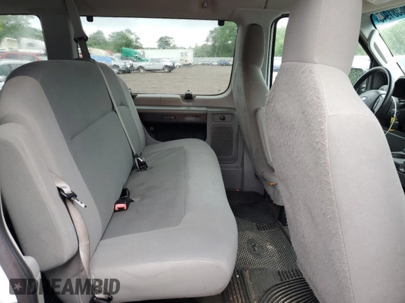2009 Ford Econoline Passenger XL with VIN 1FBNE31L49DA74498, listed as a Copart auction lot 56381945 with 95,695 mi miles and Salvage title. Bid and sale history available at DreamBid. Image 11.