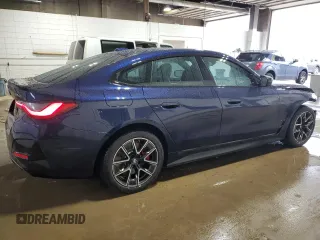 2023 BMW i4 M50 with VIN WBY33AW02PFR25192, listed as a Copart auction lot 54770804 with 7,102 mi miles and Salvage Title. Bid and sale history available at carsss.com. Image 3.