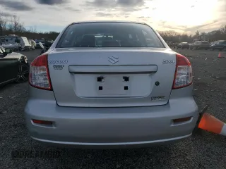 2011 Suzuki SX4 LE with VIN JS2YC5A23B6300189, listed as a Copart auction lot 85389574 with 71,272 mi miles and Clean Title. Bid and sale history available at carsss.com. Image 6.