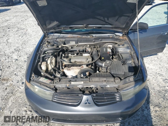 2003 Mitsubishi Galant ES z VIN 4A3AA46G03E042881, wystawiony jako Copart lot #61861195 z przebiegiem 139 049 mil mil oraz Czysty tytuł • Clean title. Historia ofert i sprzedaży dostępna na DreamBid. Obrazek 11.