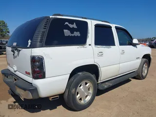 2002 GMC Yukon SLT with VIN 1GKEC13Z02J244875, listed as a IAAI auction lot 41657514 with 329,288 mi miles. Bid and sale history available at carsss.com. Image 4.