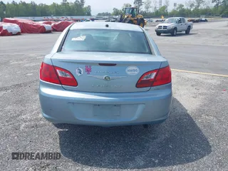 2009 Chrysler Sebring Touring z VIN 1C3LC56B89N517786, wystawiony jako IAAI lot #36918020 z przebiegiem 125 567 mil mil oraz . Historia ofert i sprzedaży dostępna na DreamBid. Obrazek 15.