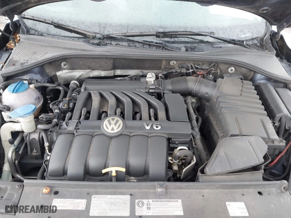 2013 Volkswagen Passat SEL Premium with VIN 1VWCM7A35DC061462, listed as a IAAI auction lot 41767171 with 163,708 mi miles. Bid and sale history available at carsss.com. Image 10.