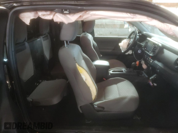 2023 Toyota Tacoma SR z VIN 3TYRZ5CN0PT032427, wystawiony jako Copart lot #87620985 z przebiegiem 32 010 mil mil oraz Szkoda całkowita • Salvage title. Historia ofert i sprzedaży dostępna na DreamBid. Obrazek 10.