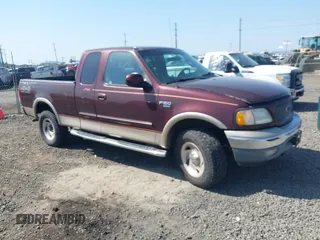 2000 Ford F-150 XL z VIN 1FTRX18L0YKA02144, wystawiony jako IAAI lot #42149124 z przebiegiem 189 528 mil mil oraz . Historia ofert i sprzedaży dostępna na DreamBid. Obrazek 1.