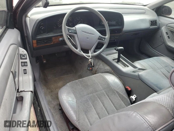 1993 Ford Thunderbird z VIN 1FAPP624XPH165181, wystawiony jako Copart lot #56587485 z przebiegiem 78 273 mil mil oraz Szkoda całkowita • Salvage title. Historia ofert i sprzedaży dostępna na DreamBid. Obrazek 8.