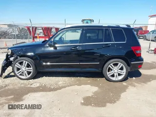 2012 Mercedes-Benz GLK with VIN WDCGG8HB6CF841198, listed as a IAAI auction lot 42021083 with 162,930 mi miles. Bid and sale history available at carsss.com. Image 15.