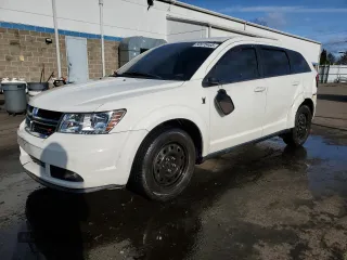 2014 Dodge Journey SE with VIN 3C4PDCAB8ET244624, listed as a Copart auction lot 50975465 with 101,623 mi miles and Salvage Title. Bid and sale history available at carsss.com. Image 1.