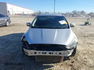 2016 Ford Focus SE with VIN 1FADP3F27GL390830, listed as a IAAI auction lot 41665012 with 119,673 mi miles. Bid and sale history available at carsss.com. Image 12.