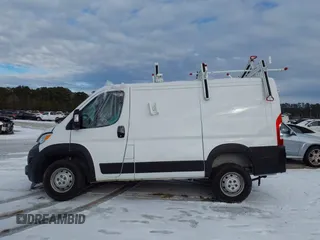 2023 Ram ProMaster Cargo with VIN 3C6LRVNG1PE548538, listed as a IAAI auction lot 41082571 with 21,357 mi miles and . Bid and sale history available at DreamBid. Image 13.