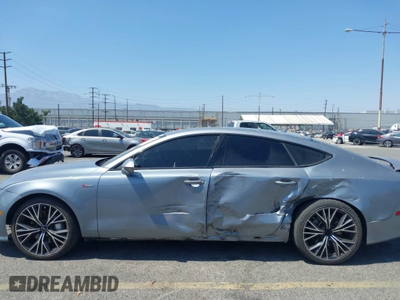 2018 Audi A7 Premium Plus z VIN WAUW3AFC1JN026763, wystawiony jako IAAI lot #42359297 z przebiegiem 108 937 mil mil oraz . Historia ofert i sprzedaży dostępna na DreamBid. Obrazek 6.