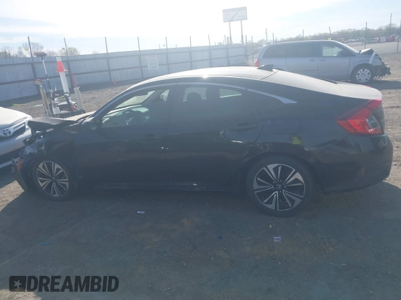 2016 Honda Civic EX-T z VIN 2HGFC1F3XGH630558, wystawiony jako IAAI lot #41868334 z przebiegiem 154 452 mil mil oraz . Historia ofert i sprzedaży dostępna na DreamBid. Obrazek 14.