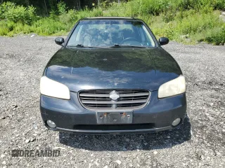 2001 Nissan Maxima SE with VIN JN1CA31D51T826665, listed as a Copart auction lot 63683545 with 95,931 mi miles and Salvage title. Bid and sale history available at DreamBid. Image 5.