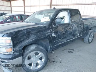 2014 Chevrolet Silverado 1500 LTZ with VIN 1GCVKSEC9EZ165028, listed as a IAAI auction lot 41444111 with 121,929 mi miles and . Bid and sale history available at DreamBid. Image 6.