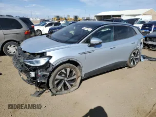 2021 Volkswagen ID.4 Pro S z VIN WVGUNPE23MP063611, wystawiony jako Copart lot #50923915 z przebiegiem 15 773 mil mil oraz Szkoda całkowita • Salvage title. Historia ofert i sprzedaży dostępna na DreamBid. Obrazek 1.