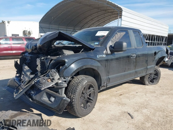 2016 Ford F-150 XL with VIN 1FTEX1C80GKD10379, listed as a IAAI auction lot 41313355 with 133,058 mi miles and . Bid and sale history available at carsss.com. Image 2.