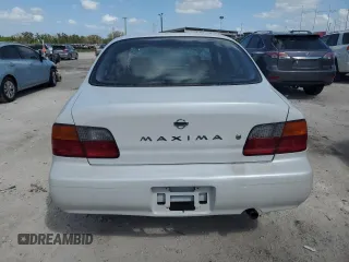1995 Nissan Maxima GLE с VIN JN1CA21D6ST059369, выставлен на аукционе Copart как лот 74794884 с пробегом 246 806 миль миль и Списание • Salvage title. История ставок и продаж доступна на DreamBid. Изображение 6.