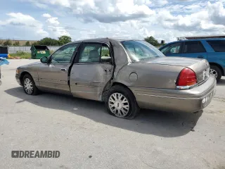 2003 Ford Crown Victoria LX с VIN 2FAHP74W63X124565, выставлен на аукционе Copart как лот 71051034 с пробегом 89 976 миль миль и Списание • Salvage title. История ставок и продаж доступна на DreamBid. Изображение 2.