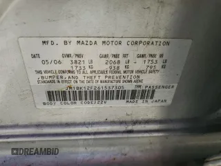 2006 Mazda 3 i with VIN JM1BK12F261537305, listed as a Copart auction lot 42549055 with Not Provided miles and Salvage Title. Bid and sale history available at carsss.com. Image 14.
