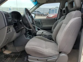 1999 Isuzu Rodeo S with VIN 4S2CM58W8X4314512, listed as a Copart auction lot 55467544 with 227,541 mi miles and Salvage Title. Bid and sale history available at carsss.com. Image 7.