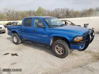 2000 Dodge Dakota Sport with VIN 1B7GG2AN0YS699193, listed as a Copart auction lot 51438325 with 127,106 mi miles and Salvage Title. Bid and sale history available at carsss.com. Image 4.